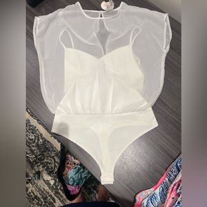 Beautiful white bodysuit with open back